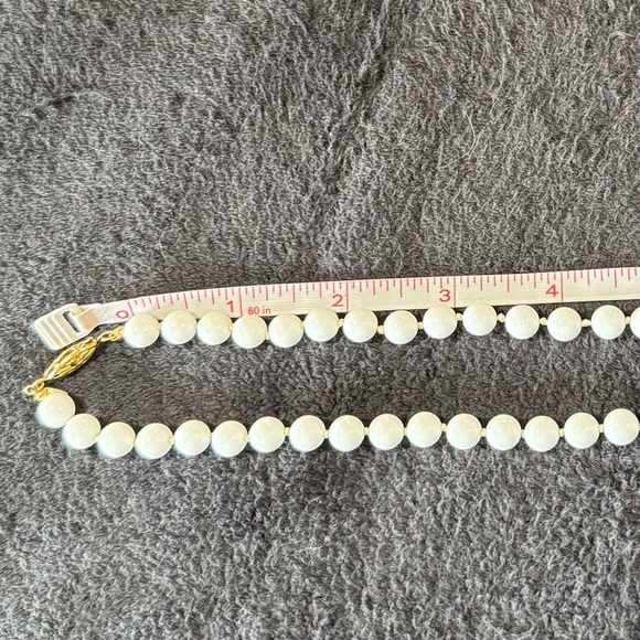 Napier Single Strand Gold-toned Clasp Necklace which is Embossed. - Picture 6 of 8